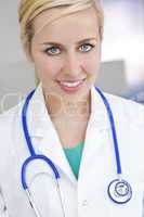 Attractive Smiling Blond Woman Doctor With Stethoscope