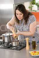 Cook - plus size woman preparing Italian food