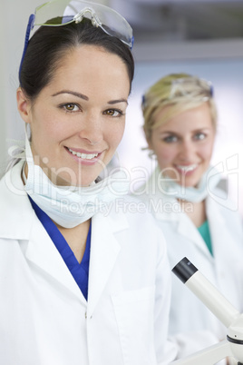 Attractive Scientists or Woman Doctors In Laboratory