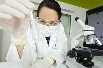 Female Scientist or Woman Doctor With Test Tube In Laboratory