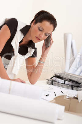 Female architect with telephone