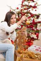 Young woman with Christmas decoration