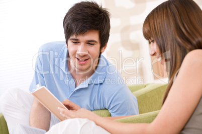 Student - two teenager reading book home