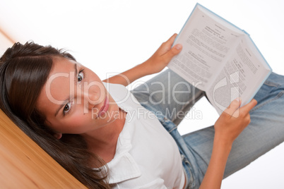 Brown hair teenager lying on wooden floor