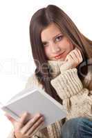 Portrait of young happy woman with book