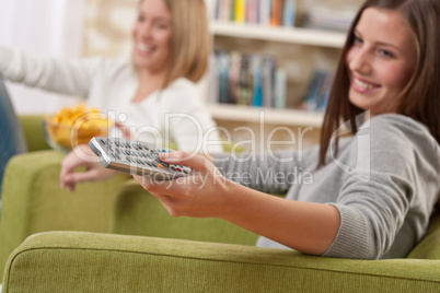 Students - Two female teenager watching television