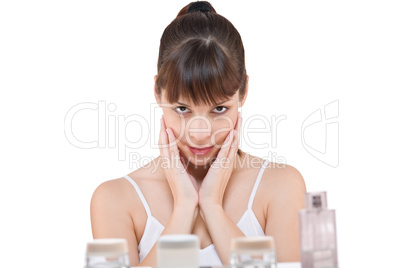 Body care: Portrait of young woman in bathroom