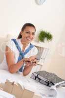 Young female architect sitting at the office