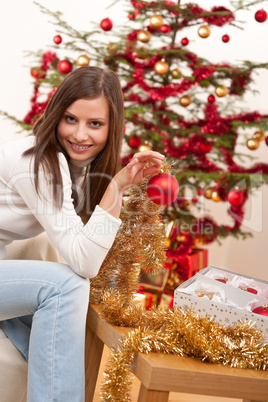 Young woman with Christmas decoration