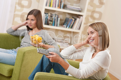 Students - Two female teenager watching television