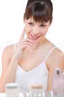 Body care: Portrait of young woman in bathroom