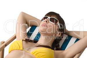 Beach - Woman listen to music in bikini