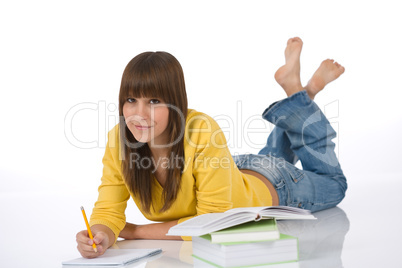 Student - Happy female teenager write homework