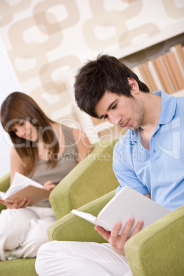 Student - two teenager reading book home