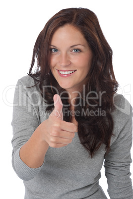 Happy young woman showing thumbs-up