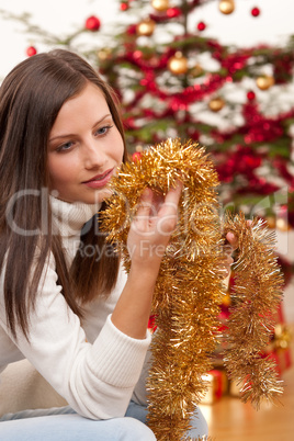 Young woman with Christmas decoration