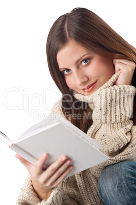 Portrait of young happy woman with book