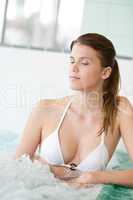 Swimming pool - beautiful woman in bikini