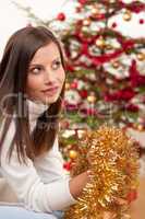 Young woman with Christmas decoration