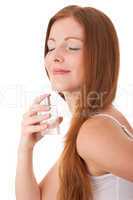 Body care series - Young red hair woman enjoying smell of perfum