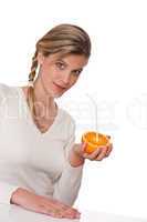 Healthy lifestyle series - Woman holding orange