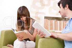 Student - two teenager reading book home