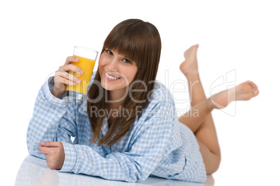 Female teenager with healthy orange juice