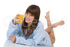 Female teenager with healthy orange juice