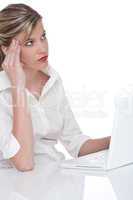 Blond attractive woman working with laptop