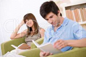 Student - two teenager reading book home