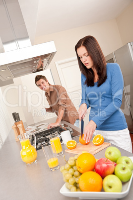 Happy couple preparing food together