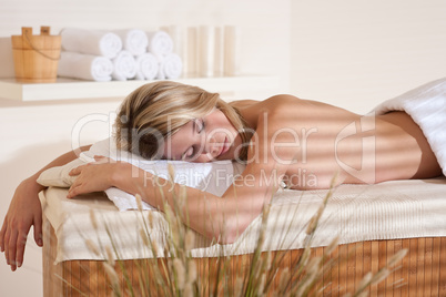 Spa - Young woman at wellness massage relaxing