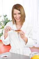 Breakfast - Happy woman with toast