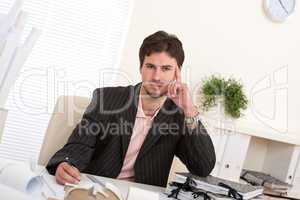 Successful professional businessman working at office