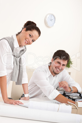 Young man and woman working together