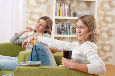 Students - Two female teenager watching television