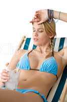 Beach - Happy woman in bikini with cold drink
