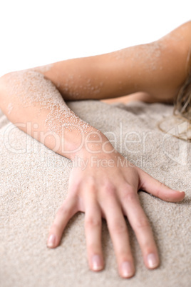 Beach - Part of female body, hand on sand