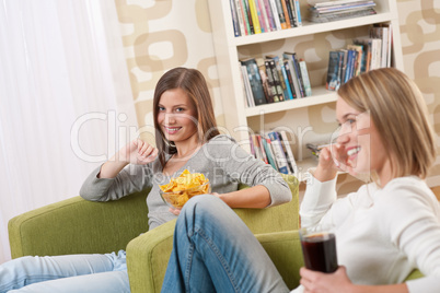 Students - Two female teenager watching television