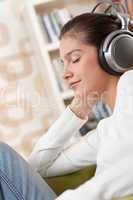 Students - Happy female teenager with headphones