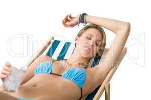 Beach - Happy woman in bikini with cold drink