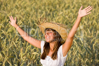 Happy woman enjoy sun in corn field