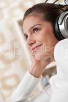 Students - Happy female teenager with headphones