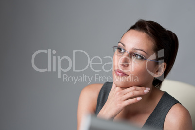 Thoughtful businesswoman thinking at office