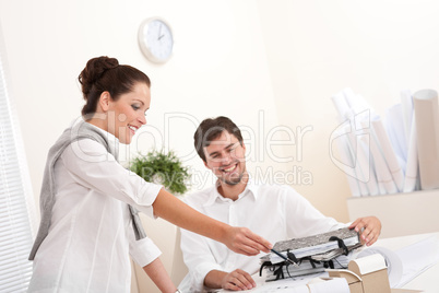 Young man and woman working together