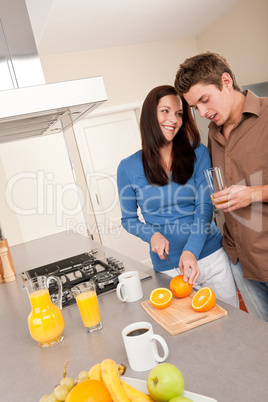 Young woman and man in the kitchen