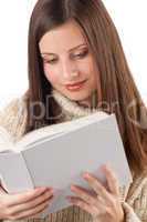 Portrait of young happy woman with book