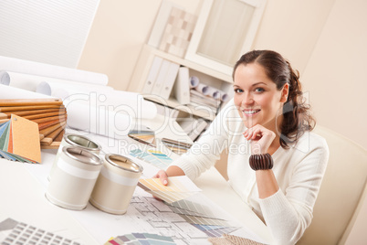 Young female interior designer at office