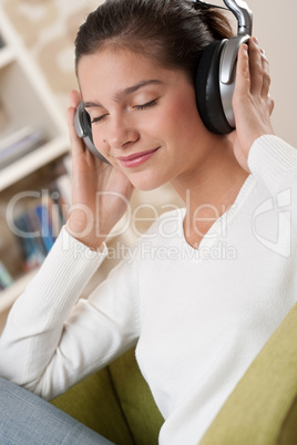 Students - Happy female teenager with headphones