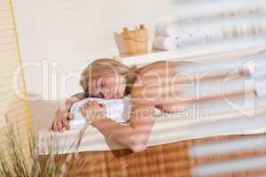 Spa - Young woman at wellness massage relaxing